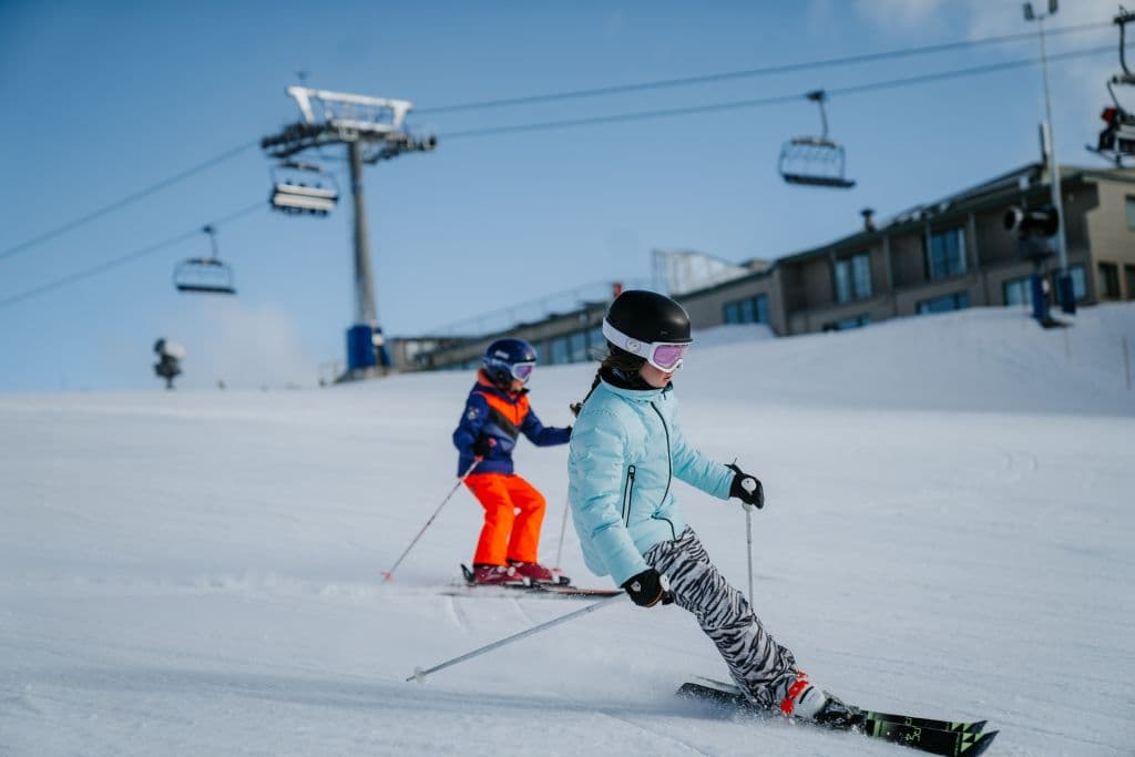 Children live their best lives skiing on Victoria's Mount Buller. Photo: Emble Studio