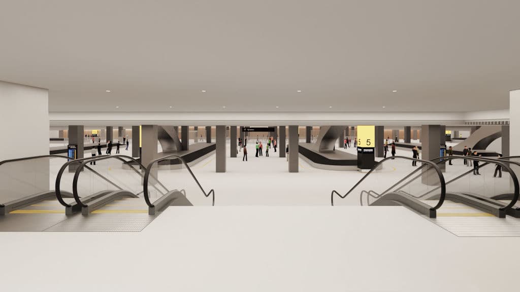 An escalator leading down toward the baggage reclaim area.