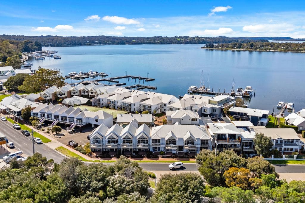 An aerial view of the white accommodation site and waterways.