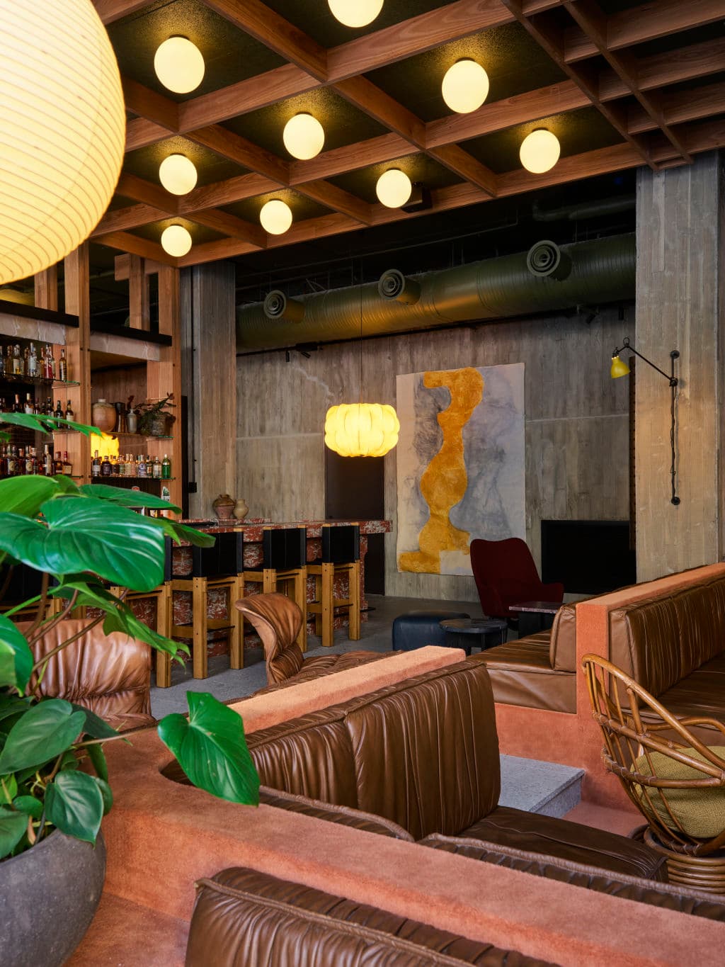 Lobby with sunken lounges and a bar