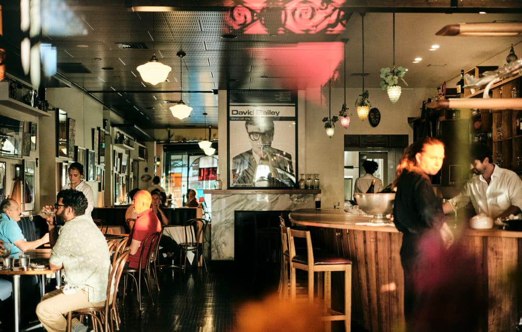 A bar with people enjoying a drink