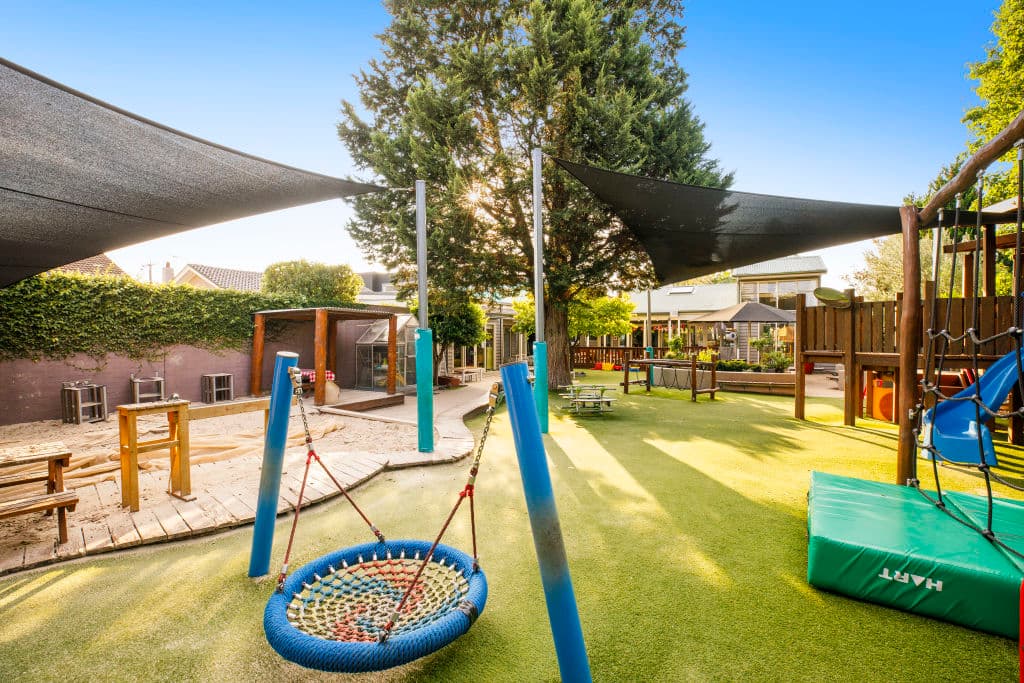Play equipment in the play area outside.