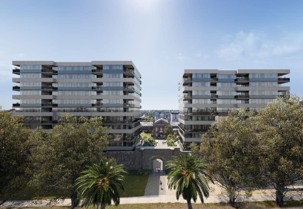 The walls that once kept in prisoners at Pentridge Prison now serve as a boundary line for the precinct.