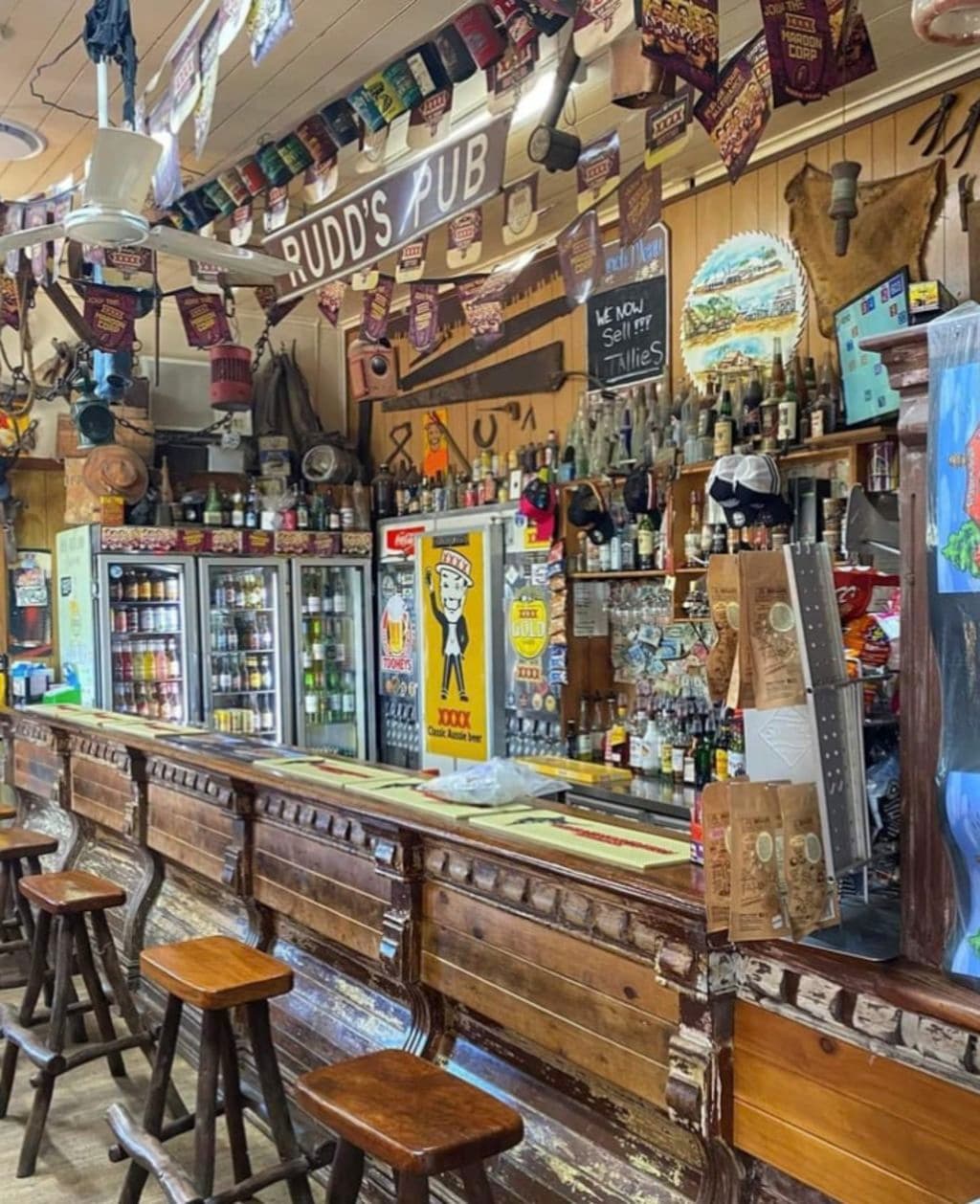 A bar adorned with farming and local history memorabilia.