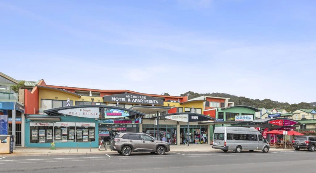 The shopfronts as seen from front on, showing a diverse range of offerings.