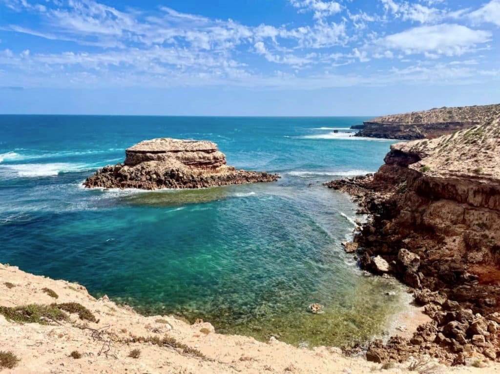 The protected cove of Streaky Bay shows rugged coastline and bright skies.