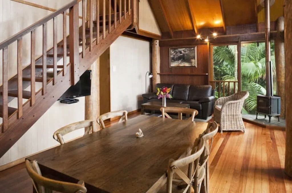 Timber tables and staircases are featured inside the villas.