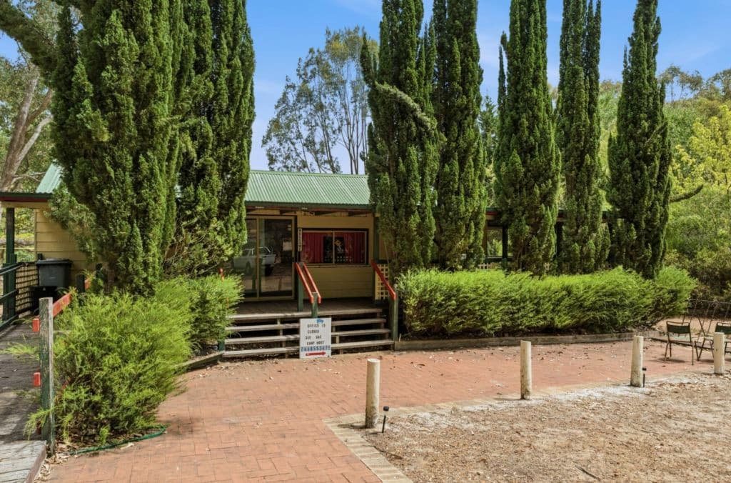The reception is housed in a small house-like structure.
