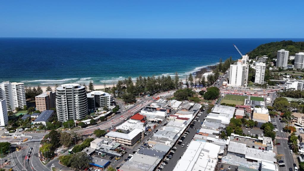 An aerial view of the blue ocean and the suburb of Burleigh Heads.
