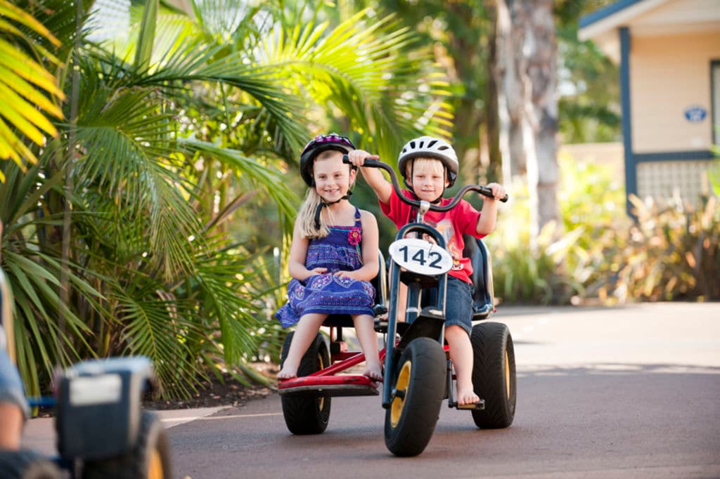 Kids on a bike.