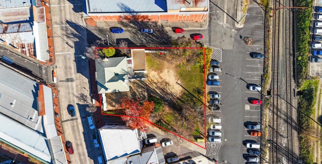 An aerial view of the land and it's spare backyard space.