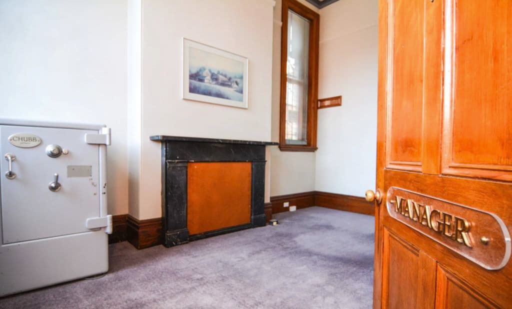 A room with some safes that were used in former banking days.