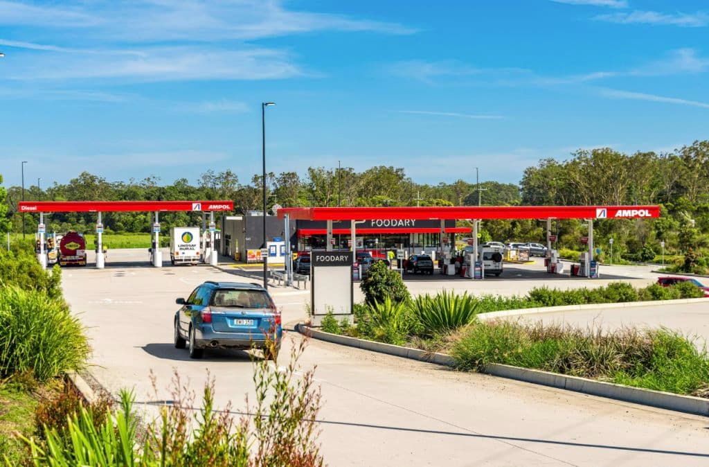 A car pulls into the service station.