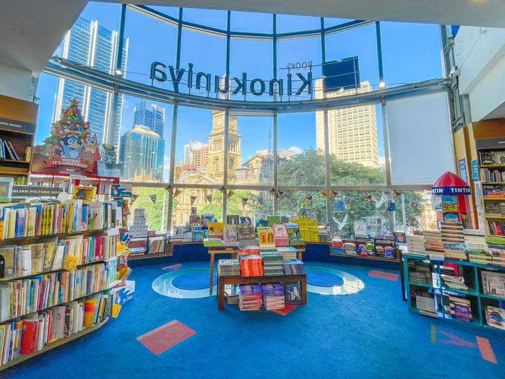 The inviting children's section at Books Kinokuniya with views of the Sydney CBD inside The Galeries.