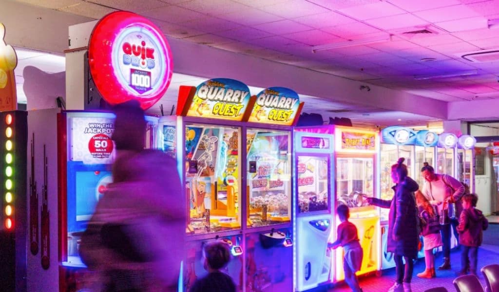 Indoor amusements for children's entertainment line the walls.