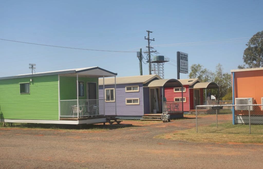 The bright cabins were painted, inspired by a town in South Africa.