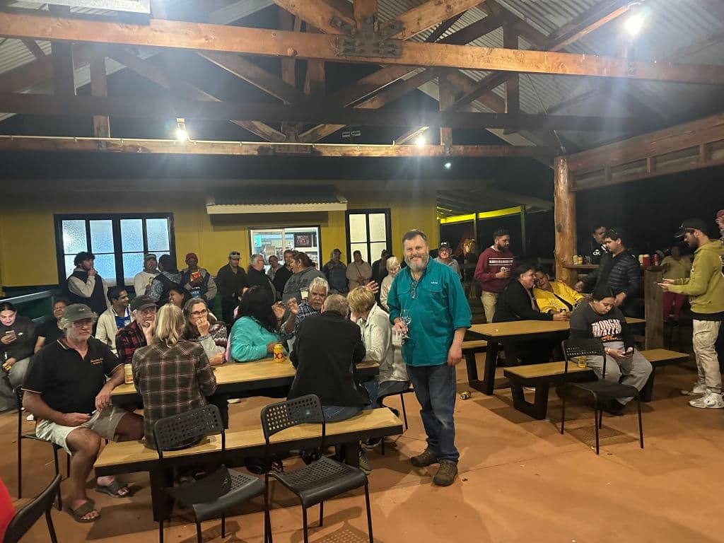 Adam in the former wool shed turned dining zone, which doubles as covered band room.