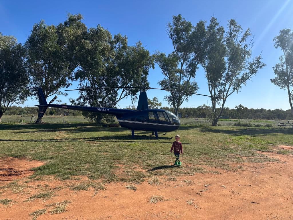 Helicopters drop down to pick up supplies, including cases of wine purchased from the Branchers.