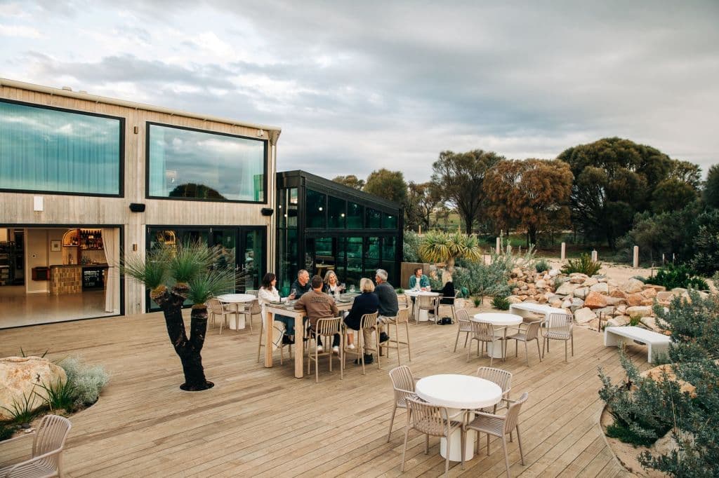 The deck at Rumi enjoys the coastal surroundings of Louth Island.