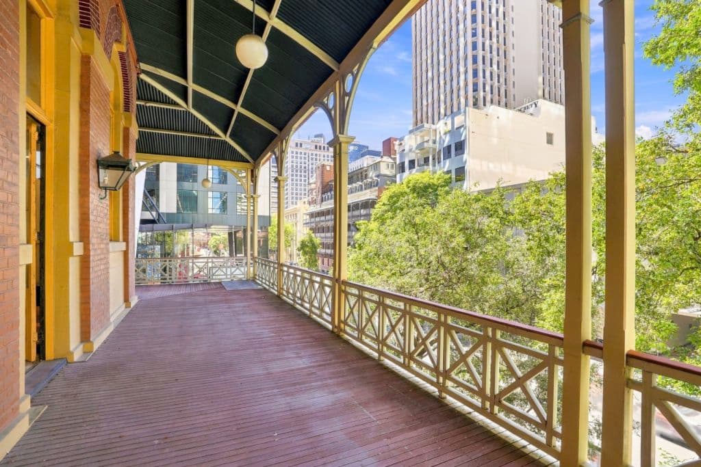 Sweeping wraparound verandas are among the building’s distinctive architectural features.