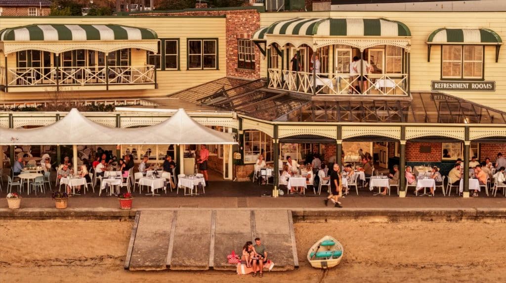 The Doyles on the Beach offers al fresco dining, featuring seafood, cocktails, and spectacular seaside views.